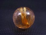 ブラジル産キャッツアイ/タイチンルチル水晶丸玉 21mm