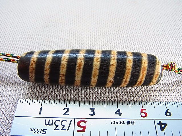 画像: アンティーク：西蔵（チベット）天珠「螺旋」（革ひも付き） 直径約15.5×57mm