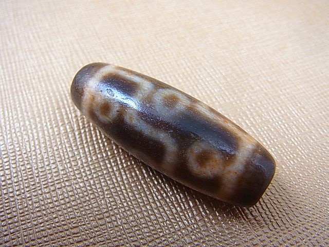 画像: 「九眼」（右下がり）現代天珠 直径約14×37.5mm